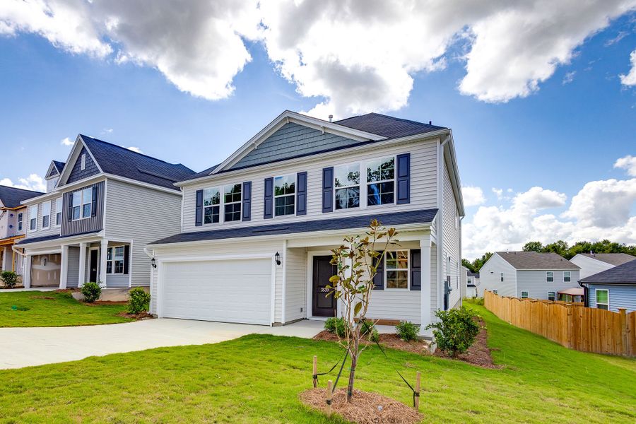Front exterior of a new home in Bluefield, Lexington, SC, highlighting curb appeal (Image 21). Front exterior of a new home in Bluefield, Lexington, SC, highlighting curb appeal (Image 21).
