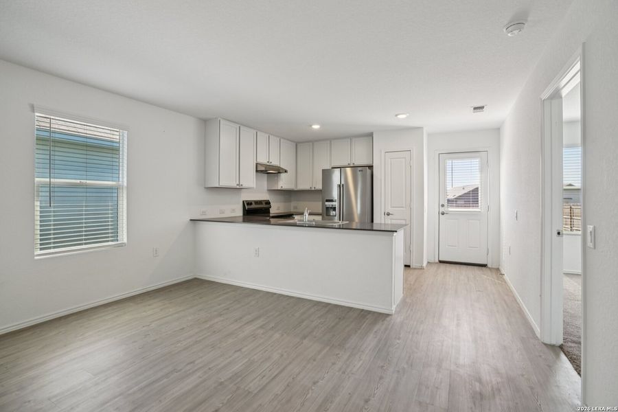 Furnished interior view inside a new home in Valle Sol, Von Ormy (Image 7).