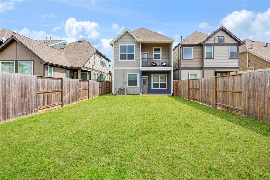Exterior details and patio area of a home in Meridiana, Iowa Colony (Image 23).