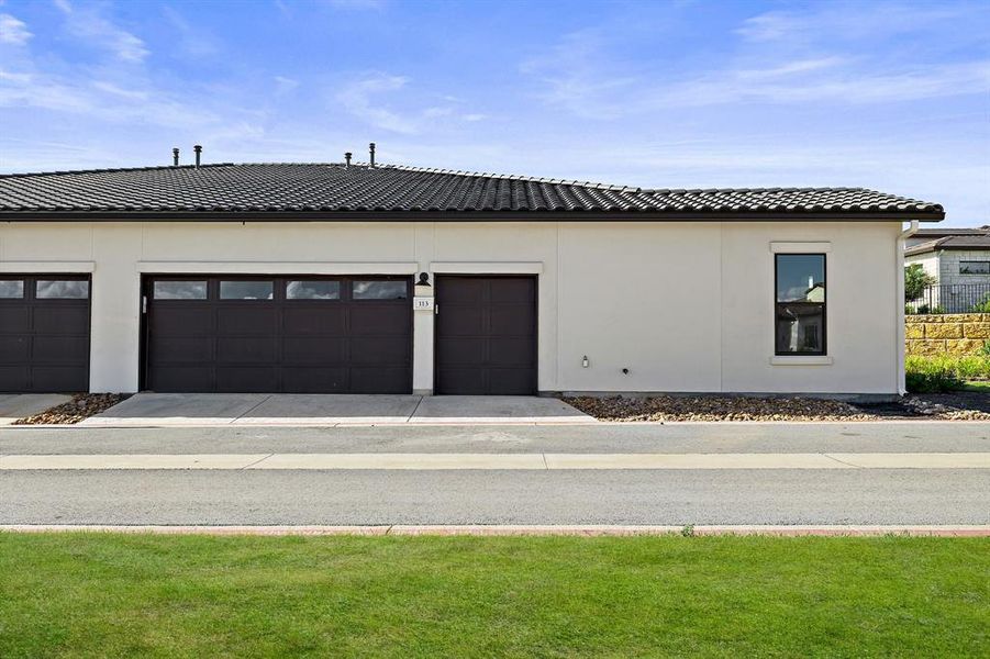 Front exterior of a new home in , Horseshoe Bay, TX, highlighting curb appeal (Image 9). Front exterior of a new home in , Horseshoe Bay, TX, highlighting curb appeal (Image 9).