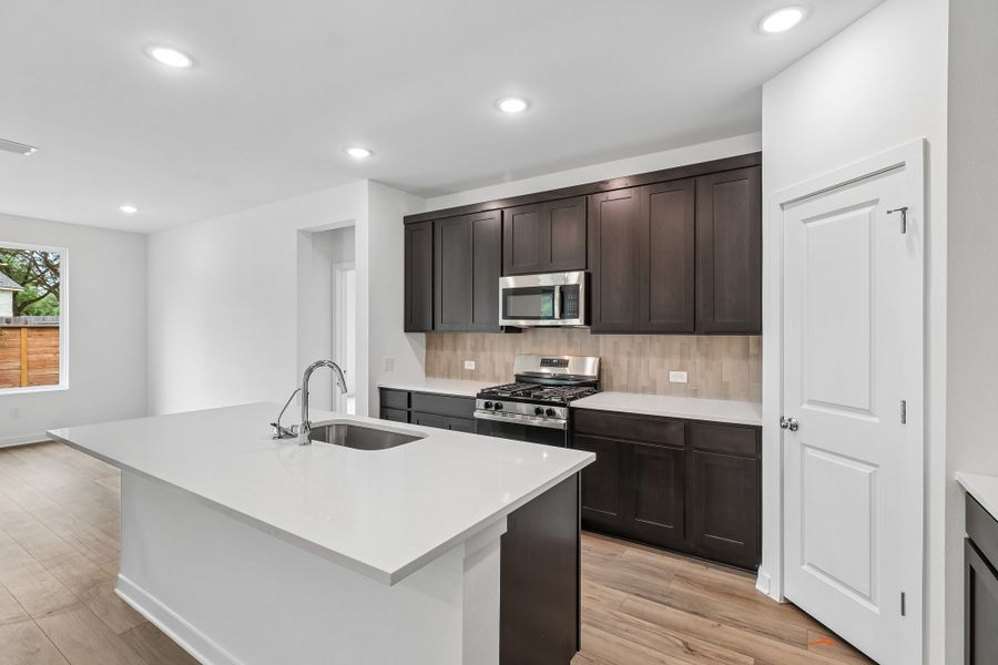 Furnished interior view inside a new home in Parkton Square, Kyle (Image 7).