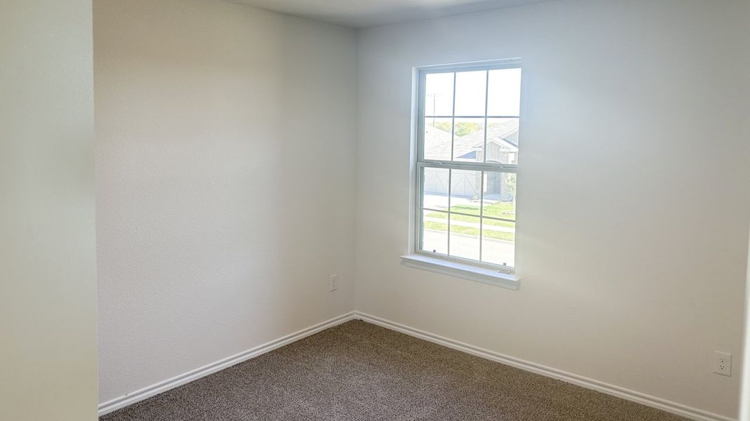 Representative unfurnished interior of a home built from the MIDLAND by D.R. Horton in Northspur, Forney (Image 18).