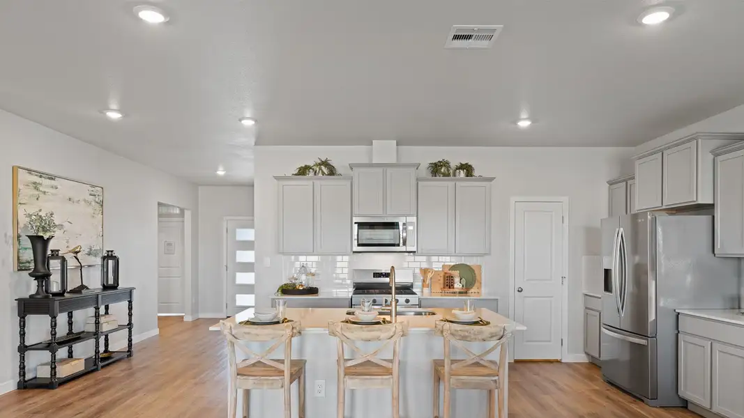 Furnished interior view inside a new home in King's Landing, Corpus Christi (Image 4).