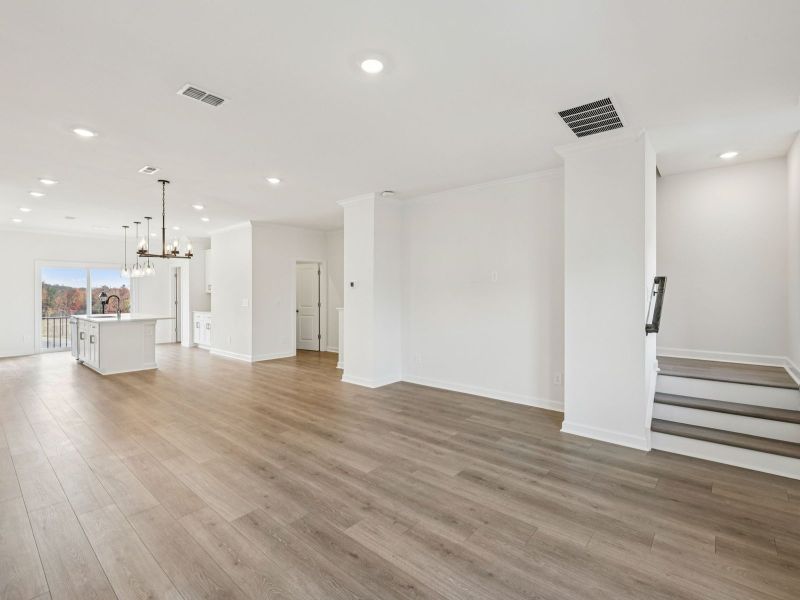 Spacious, unfurnished interior of a new home in Meadows at Wilson Farms - The Heights Series, Fort Mill (Image 13). Spacious, unfurnished interior of a new home in Meadows at Wilson Farms - The Heights Series, Fort Mill (Image 13).