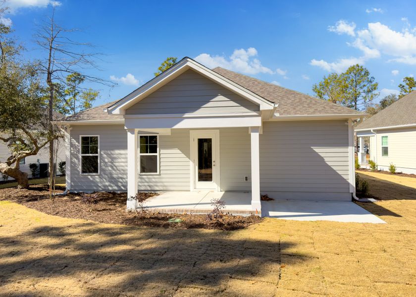 Exterior details and patio area of a home in Osprey Landing, Southport (Image 29).
