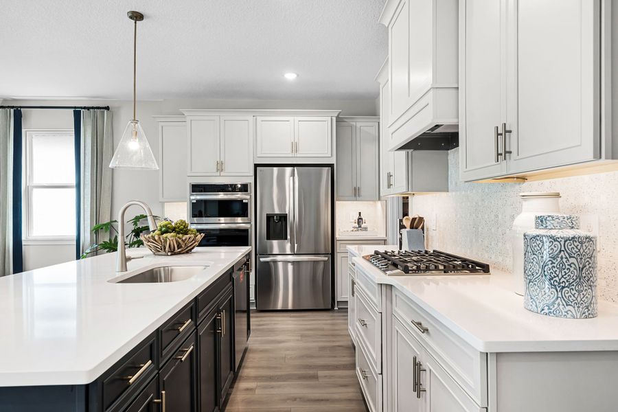 Representative furnished interior of a home built from the Paxton by Hartizen Homes in Eden Crest Single Family Homes, Apopka (Image 9).