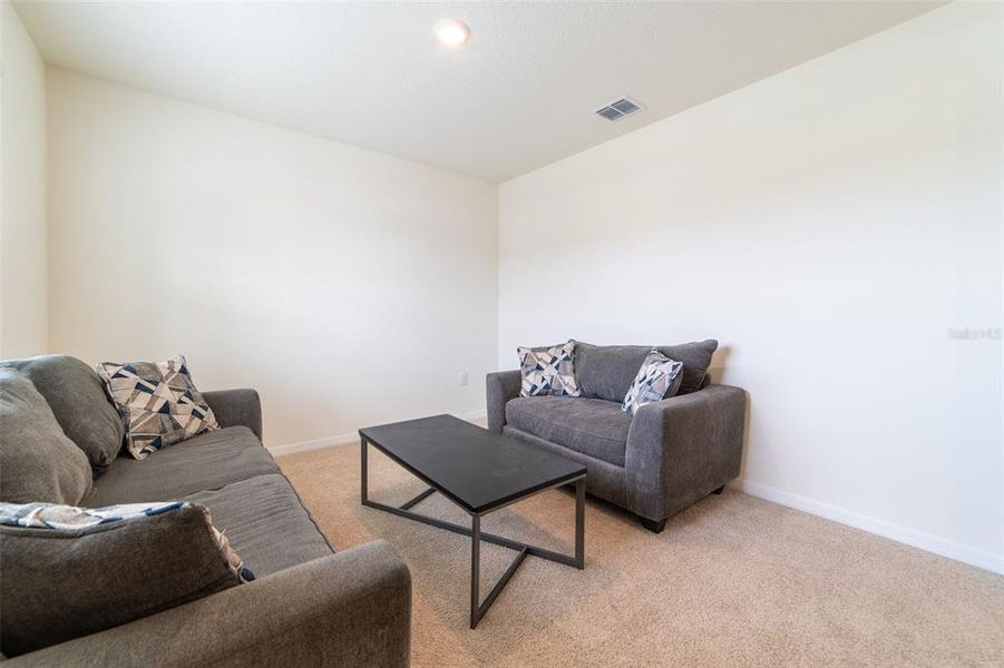Furnished interior view inside a new home in , Harmony (Image 43).