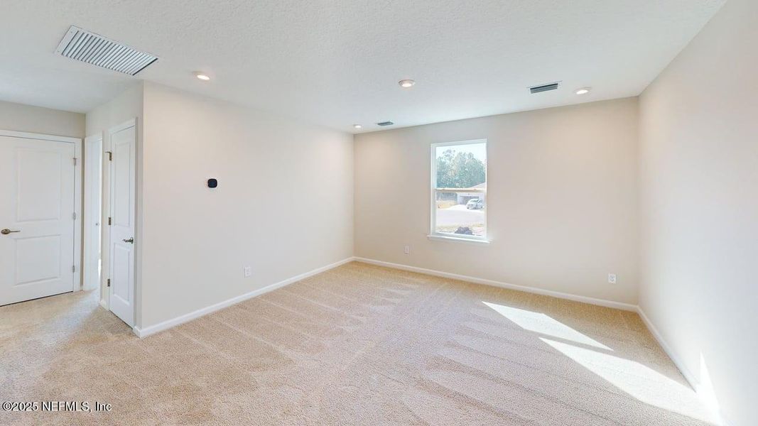 Spacious, unfurnished interior of a new home in Lakes at Bella Lago, Green Cove Springs (Image 10). Spacious, unfurnished interior of a new home in Lakes at Bella Lago, Green Cove Springs (Image 10).