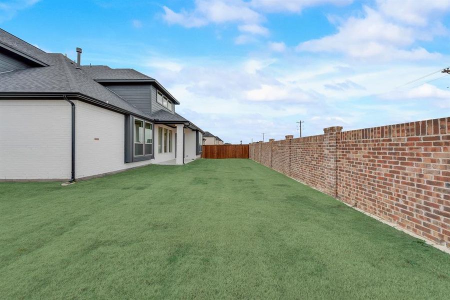 Front exterior of a new home in Estates at Rockhill, Frisco, TX, highlighting curb appeal (Image 24).