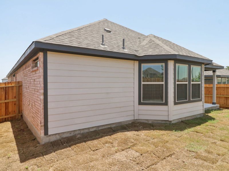 Exterior details and patio area of a home in Kallison Ranch, San Antonio (Image 25).