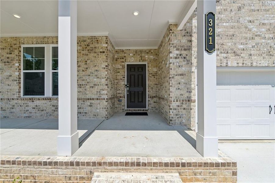 Exterior details and patio area of a home in Bailey Fence, Dacula (Image 4).