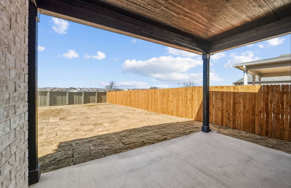 Exterior details and patio area of a home in Santa Rita Ranch, Liberty Hill (Image 26).