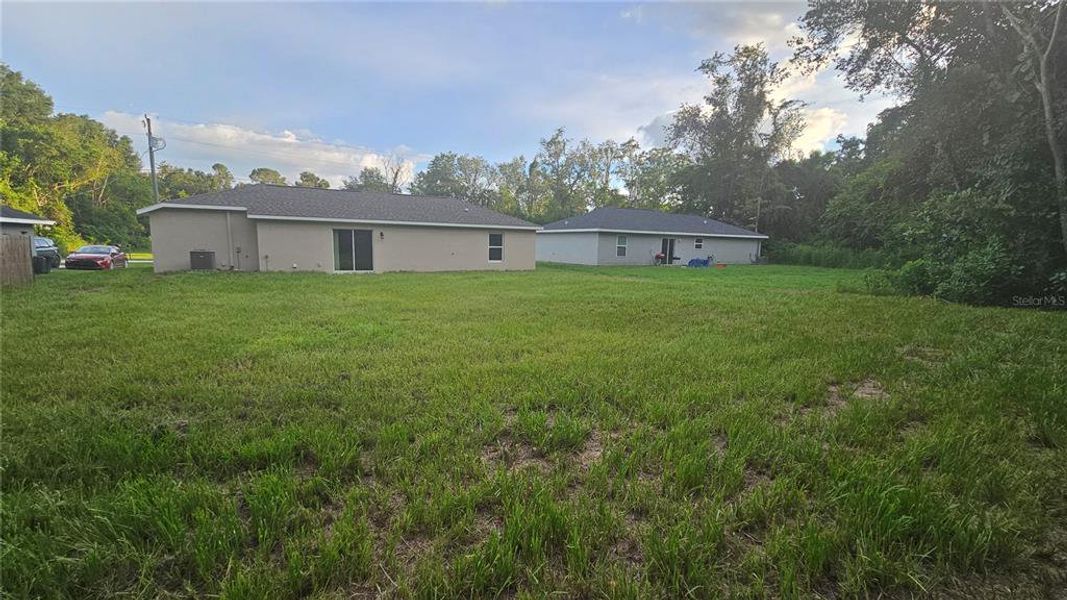Front exterior of a new home in , Belleview, FL, highlighting curb appeal (Image 2).
