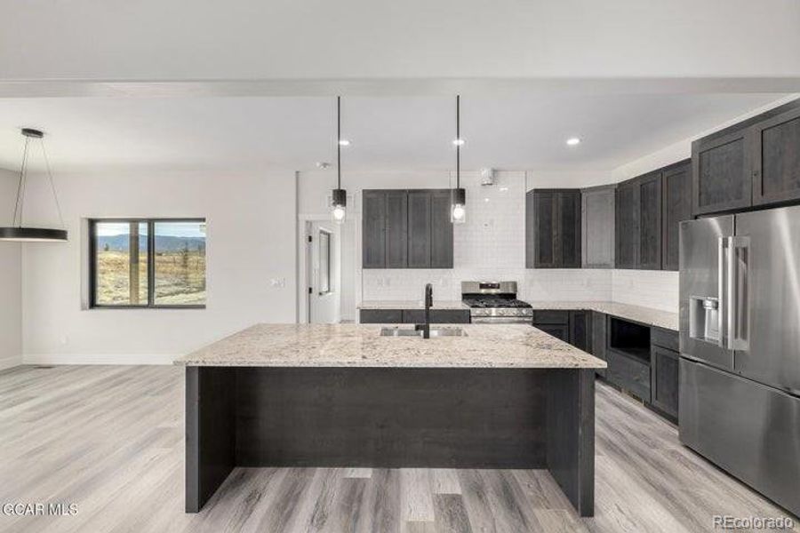 Furnished interior view inside a new home in , Granby (Image 12).