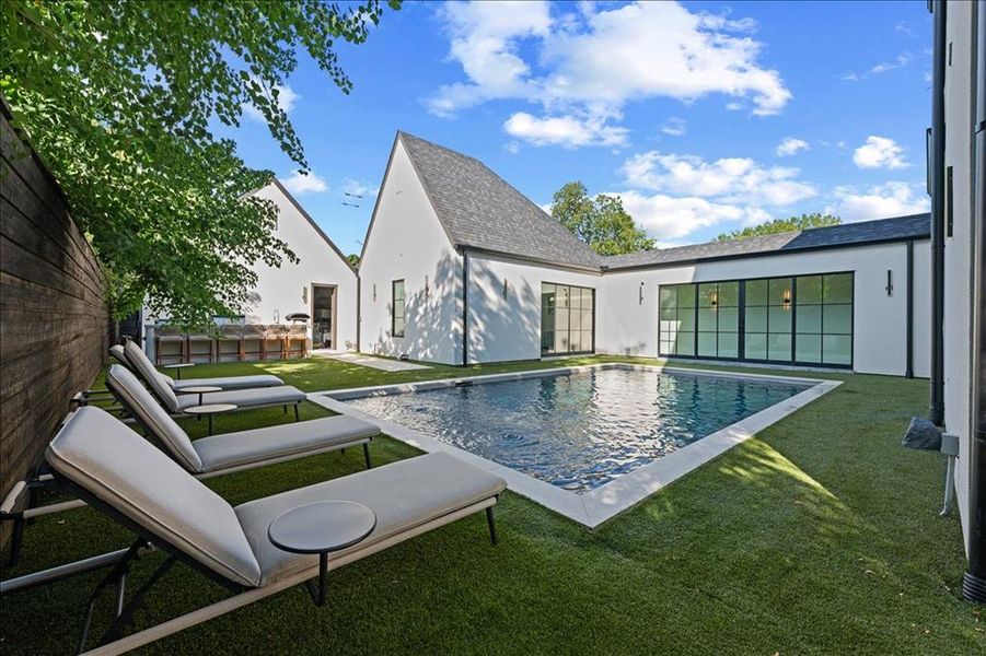 View from lounge area of swimming pool.