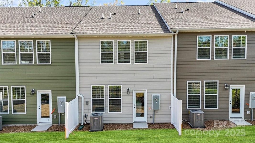 Front exterior of a new home in Clayton Crossing, Arden, NC, highlighting curb appeal (Image 20). Front exterior of a new home in Clayton Crossing, Arden, NC, highlighting curb appeal (Image 20).
