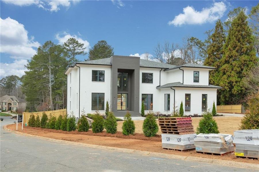 Front exterior of a new home in , Marietta, GA, highlighting curb appeal (Image 6).