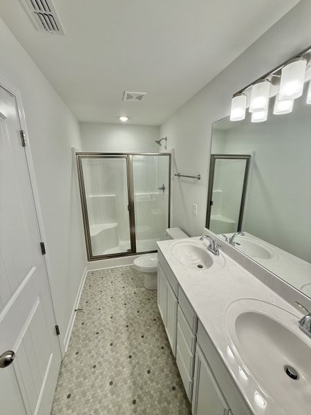 Furnished interior view inside a new home in Stone Fort Meadows, Manchester (Image 3).