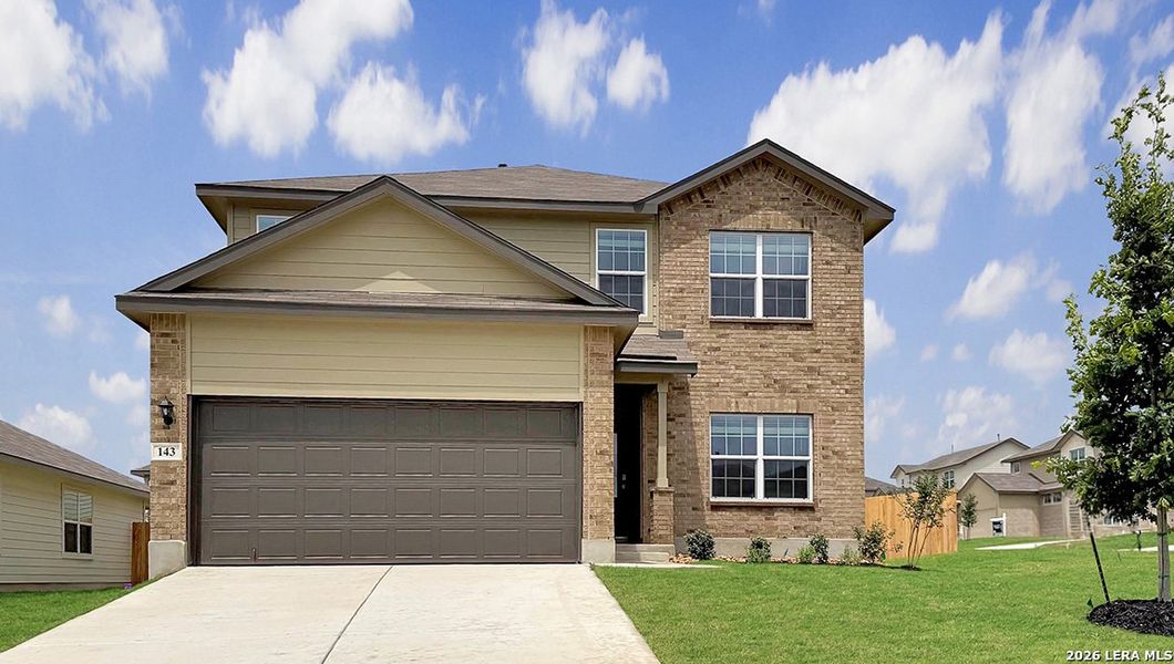 Front exterior of a new home in Redbird Ranch, San Antonio, TX, highlighting curb appeal (Image 2).