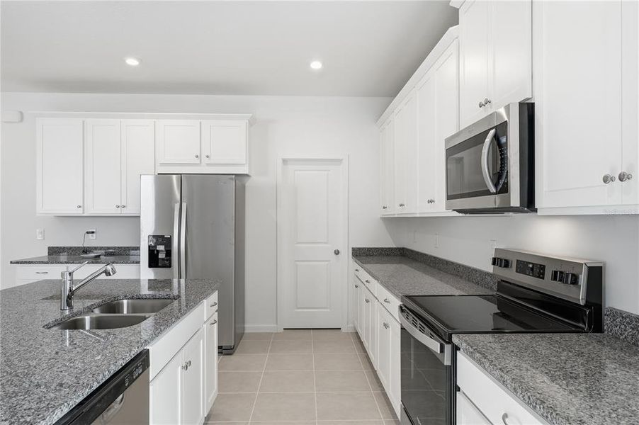 Furnished interior view inside a new home in Rainwood, Clermont (Image 11).
