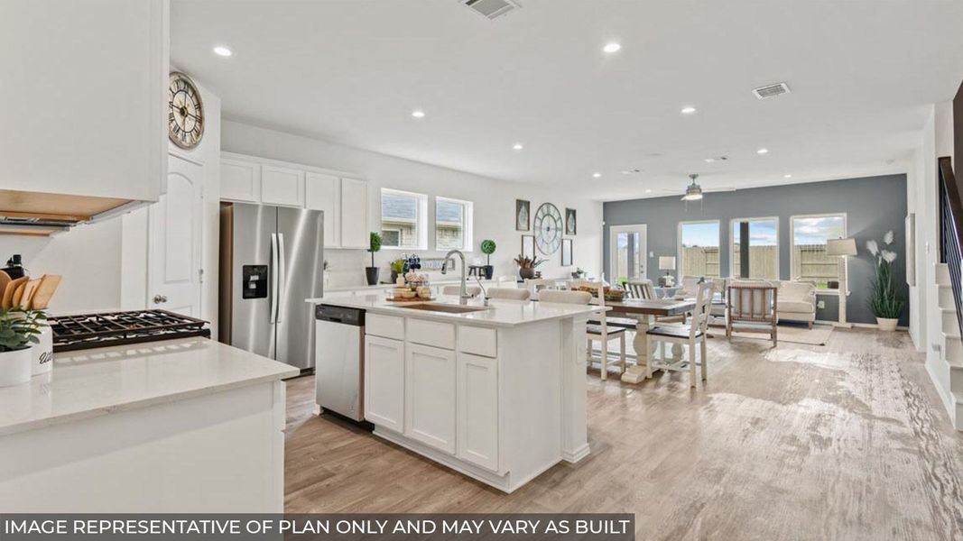 Furnished interior view inside a new home in Sunterra, Katy (Image 6).