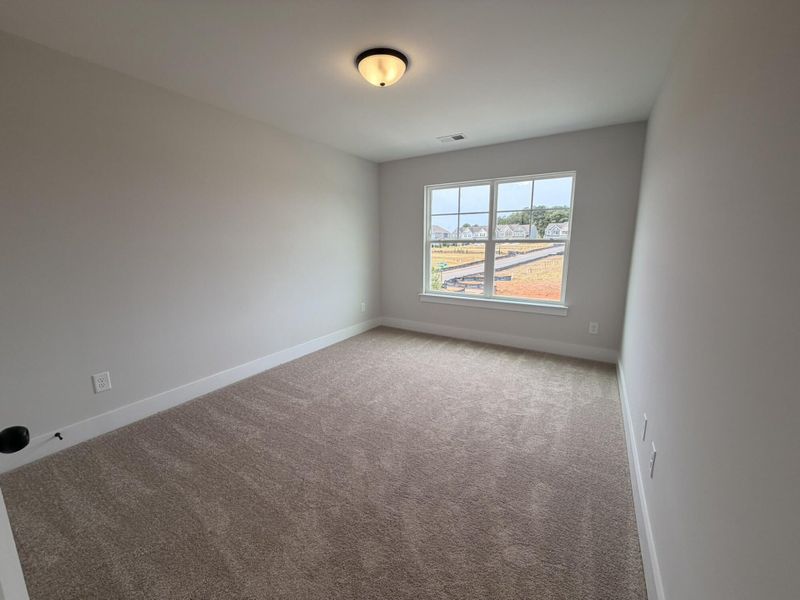 Spacious, unfurnished interior of a new home in Blythe Mill Townhomes, Waxhaw (Image 14).