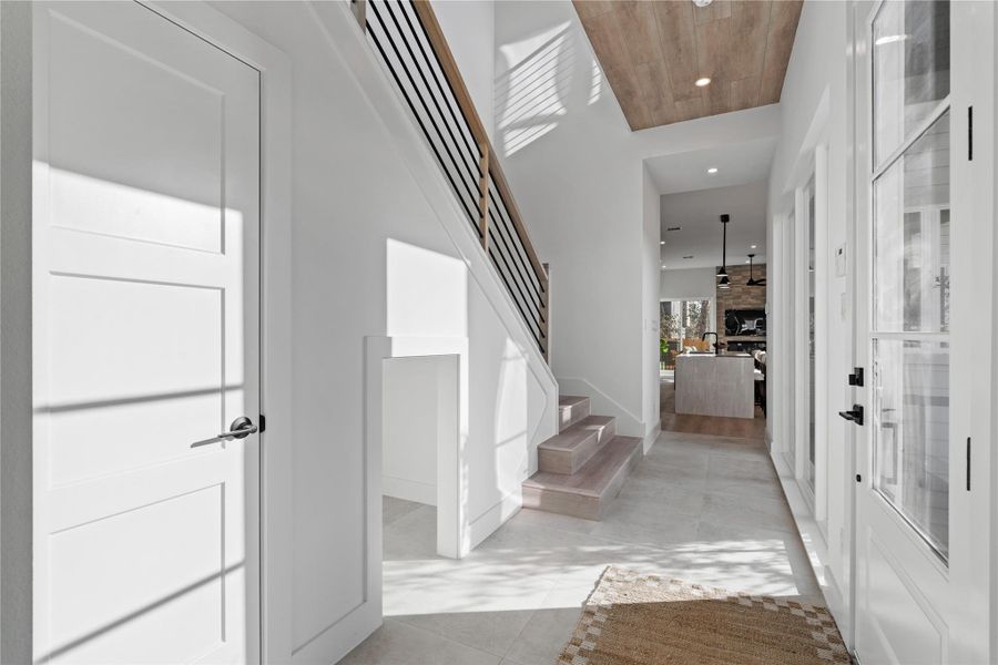 A custom alcove beneath the stairs transforms unused square footage into a charming sanctuary—ideal for pets or a cozy children’s escape. It’s a subtle detail that adds both function and personality.