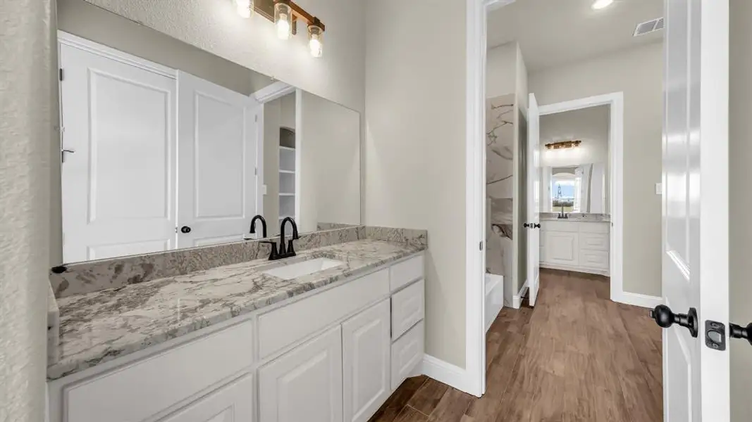 Furnished interior view inside a new home in , Poolville (Image 3).