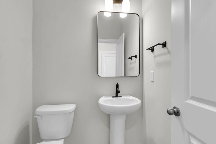 Furnished interior view inside a new home in Tidewater at Lakes of Cane Bay, Summerville (Image 11).