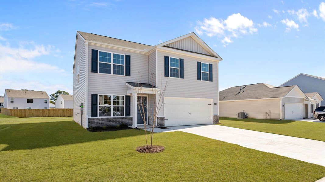Front exterior of a new home in Madeline Farm, New Bern, NC, highlighting curb appeal (Image 15).
