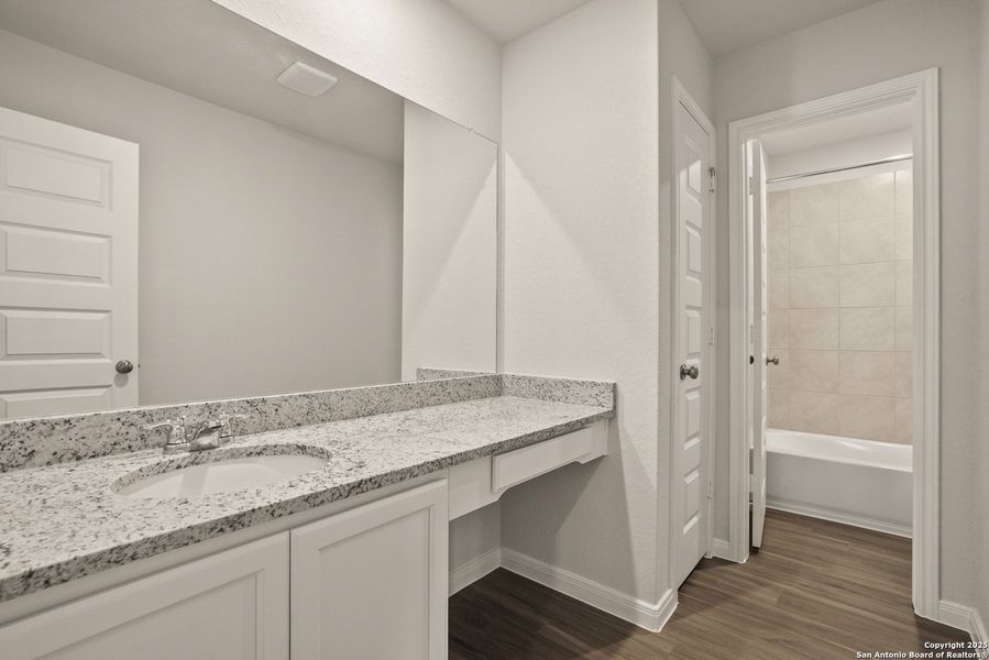 Furnished interior view inside a new home in Abbott Place, St. Hedwig (Image 6).