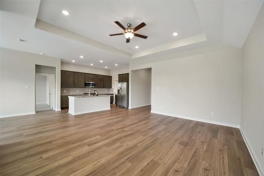 Spacious, unfurnished interior of a new home in Sunterra, Katy (Image 29).