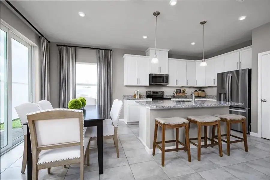 Representative furnished interior of a home built from the Adeline by Ryan Homes in Seminole Palms, Palm Coast (Image 4).