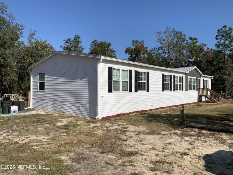 Exterior details and patio area of a home in , Interlachen (Image 25).