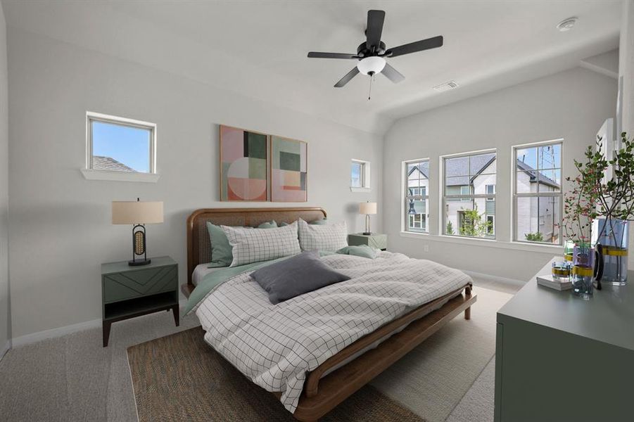 Bedroom with carpet, a ceiling fan, and lofted ceiling