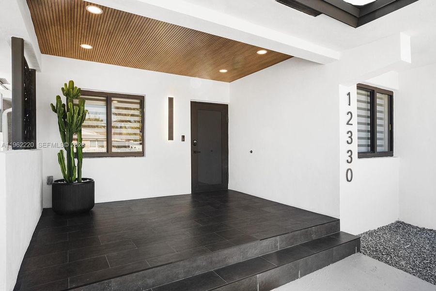 Exterior details and patio area of a home in , Miami (Image 3). Exterior details and patio area of a home in , Miami (Image 3).