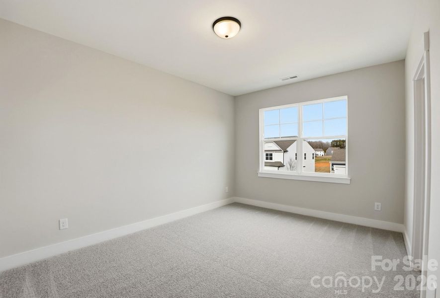 Spacious, unfurnished interior of a new home in Carrington, Stanley (Image 26).