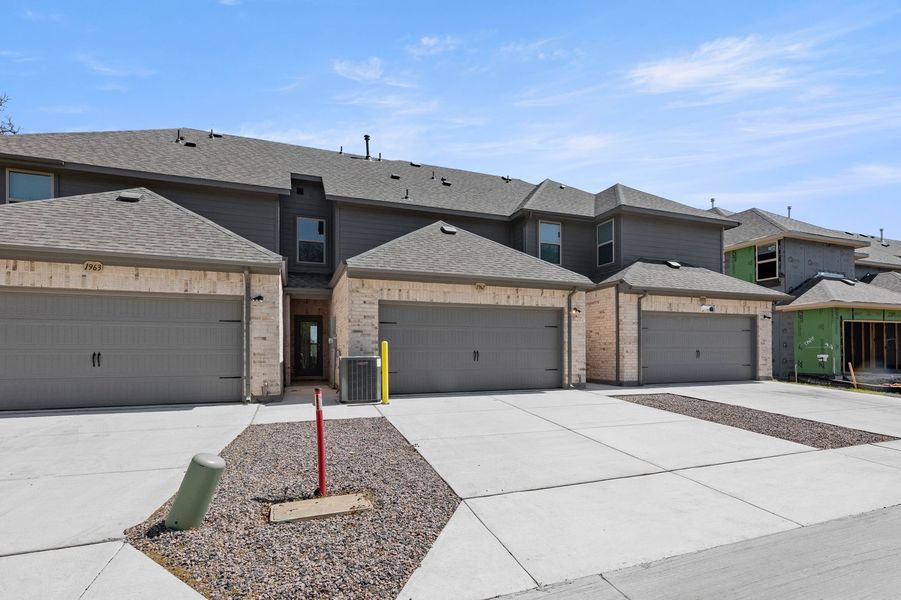 Front exterior of a new home in Timber Ridge, Corinth, TX, highlighting curb appeal (Image 28). Front exterior of a new home in Timber Ridge, Corinth, TX, highlighting curb appeal (Image 28).