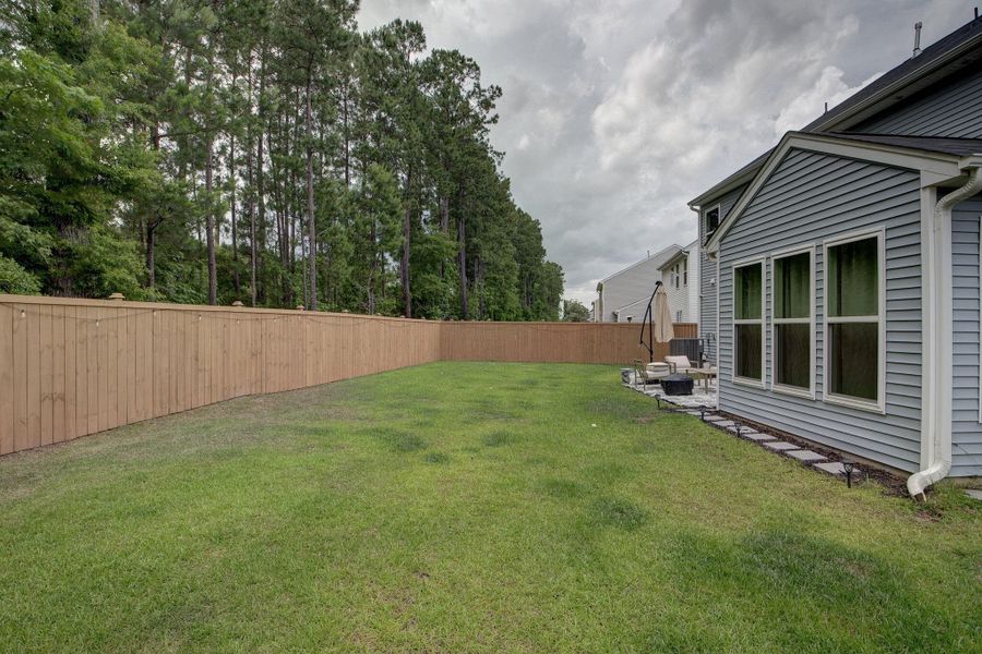 Exterior details and patio area of a home in Oakley Pointe, Moncks Corner (Image 36). Exterior details and patio area of a home in Oakley Pointe, Moncks Corner (Image 36).