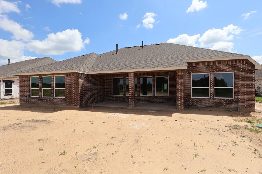 Backyard with large covered patio - still under construction! Backyard with large covered patio - still under construction!