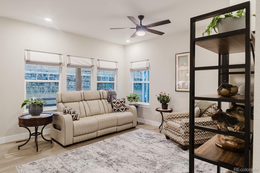 The living room has plenty of windows for natural light and warmth from the gas fireplace. The living room has plenty of windows for natural light and warmth from the gas fireplace.