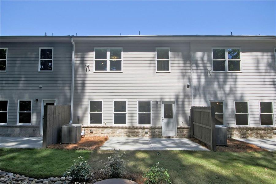 Exterior details and patio area of a home in River Walk Place, Lawrenceville (Image 3).
