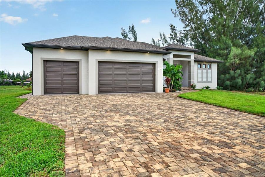 Front exterior of a new home in , Port Charlotte, FL, highlighting curb appeal (Image 29). Front exterior of a new home in , Port Charlotte, FL, highlighting curb appeal (Image 29).