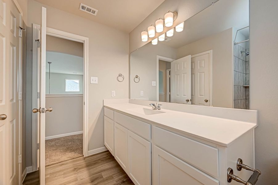 Representative furnished interior of a home built from the Floor Plan 2340 by Colina Homes in Grand Magnolia, Magnolia (Image 14). Representative furnished interior of a home built from the Floor Plan 2340 by Colina Homes in Grand Magnolia, Magnolia (Image 14).