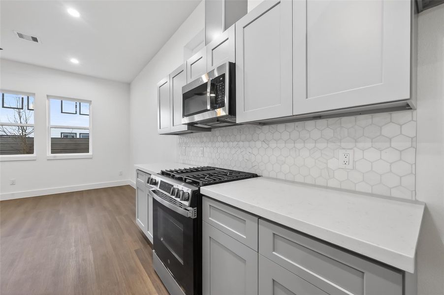 Sleek kitchen featuring modern stainless steel appliances. Sleek kitchen featuring modern stainless steel appliances.