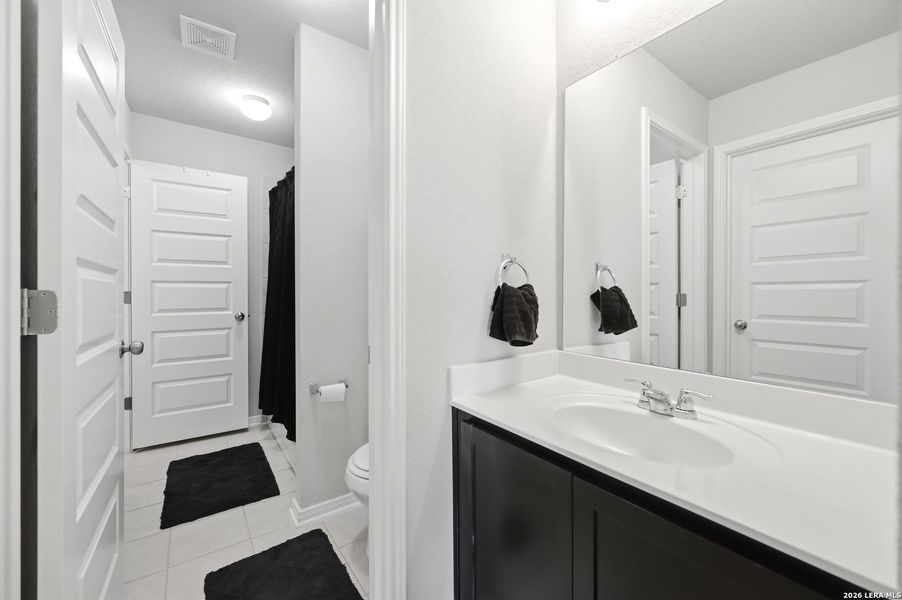Furnished interior view inside a new home in Ventana, Bulverde (Image 31).
