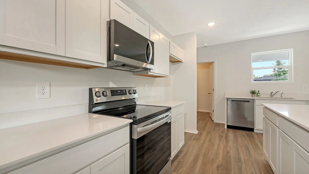 Representative furnished interior of a home built from the Maple by SimplyDwell Homes in Broadleaf, Parrish (Image 5). Representative furnished interior of a home built from the Maple by SimplyDwell Homes in Broadleaf, Parrish (Image 5).