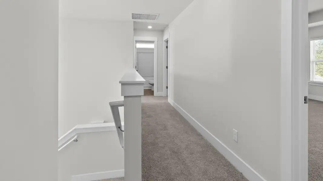 Spacious, unfurnished interior of a new home in The Highlands at Cedar Hill Landing, Navassa (Image 21).