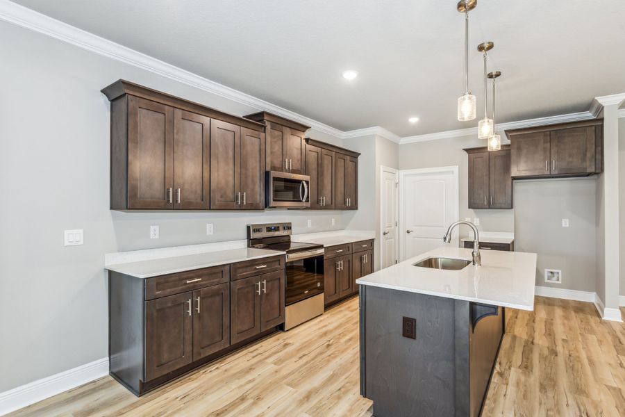 Representative furnished interior of a home built from the The Turquoise by Herbst Homes in Walther Reserve, Milton (Image 93).