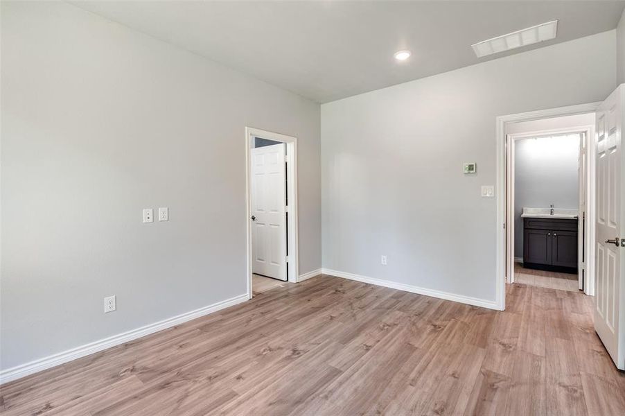 Empty room featuring light hardwood / wood-style flooring